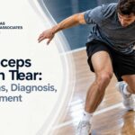 Athlete with a knee injury illustrating quadriceps tendon tear symptoms, diagnosis, and treatment.